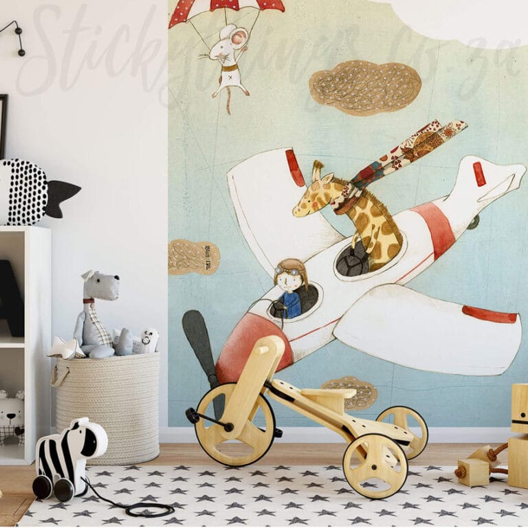Flying giraffe wall mural in colour kiddies wallpaper