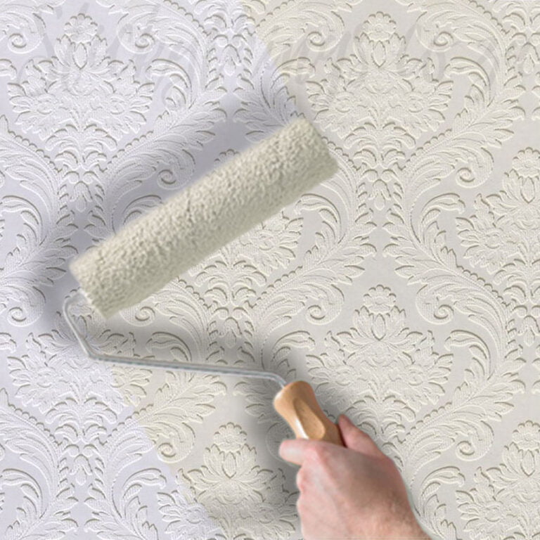 Heavy Damask Embossed Wallpaper in grey with paint roller