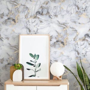 Metallic Gold Marble Wallpaper in front of small cupboard