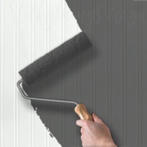 paintable beadboard wallpaper shown in white being painted a dark grey