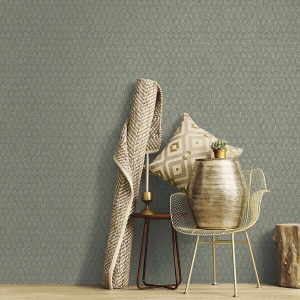 This image shows the gold and sage art deco wallpaper with a beigh carpet and chair.